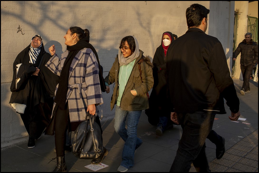 Women walking without headscarves in Tehran